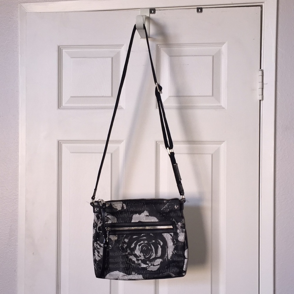 8.5” by 10” hand bag leather Lamb with silk lining